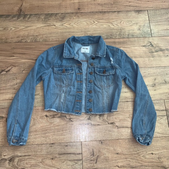 light blue distressed denim jacket